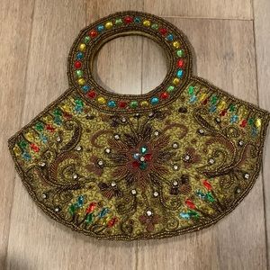 MULTI-COLORED Clutch in Handloom Silk Base with Stone Work. 10 by 9”